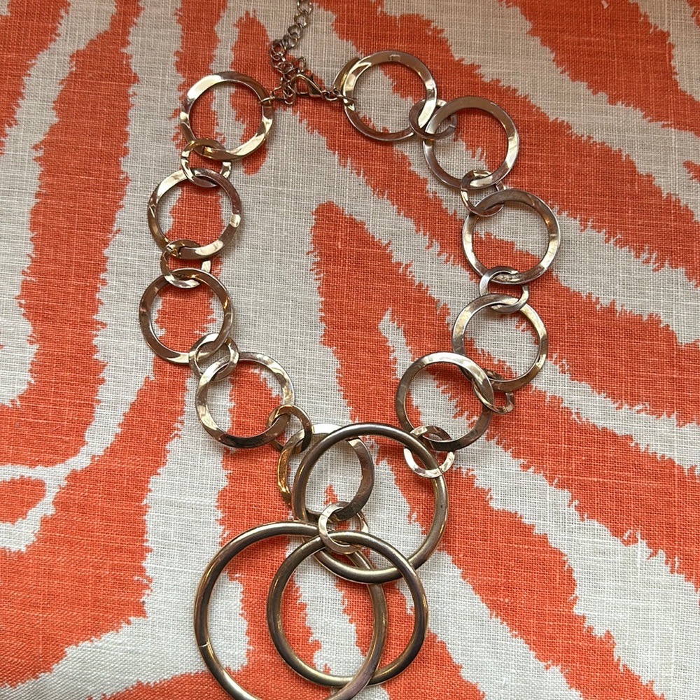 Circles of gold lightweight very pretty necklace 18” long. Marked NY.